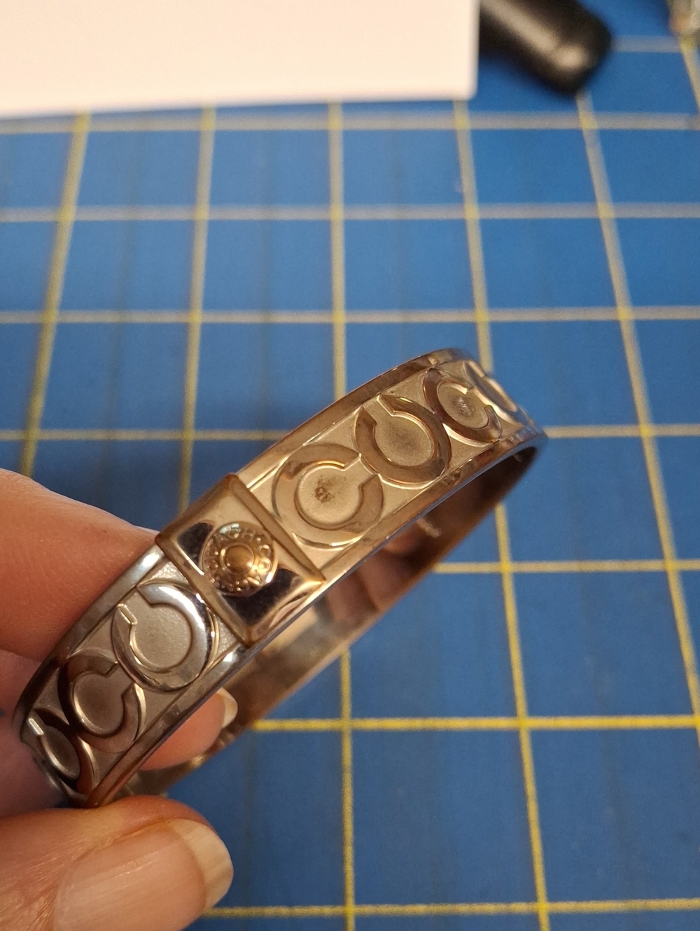 Coach Silver-Tone Logo Cuff 0.5x3" Bracelet